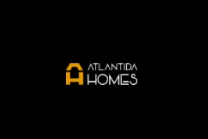 Una de las mejores constructoras de casas prefabricadas en Madrid es Atlántida Homes, logo